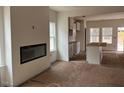 Living room with fireplace, recessed lighting, and an open floor plan to the kitchen at 1003 Shovelhead Dr # 2, Durham, NC 27703