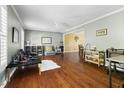 Spacious living room with hardwood floors, ample natural light, and neutral color palette at 109 Bessemer Pl, Durham, NC 27712