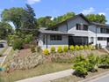 Well-maintained home featuring professional landscaping on a beautiful sunny day at 1101 Norris St, Raleigh, NC 27604