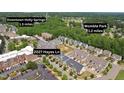 Aerial view of property at 2027 Hayes Ln, convenient to nearby Womble Park and downtown Holly Springs at 2027 Hayes Ln, Holly Springs, NC 27540