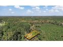 Aerial view of property showing lot lines surrounded by mature trees in a serene, wooded area at 2605 Joe Pruitt Rd, Oxford, NC 27565