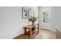 Bright entryway featuring a wooden console table, stylish decor, and a welcoming atmosphere at 4412 Powell Grove Ct, Raleigh, NC 27606