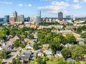An aerial view showing the property's neighborhood and proximity to the city skyline at 215 Haywood St, Raleigh, NC 27601