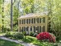 Inviting home with a well-kept lawn and vibrant landscaping at 315 King George Loop, Cary, NC 27511
