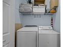 Functional laundry room equipped with modern Samsung washer and dryer at 712 Portstewart Dr, Cary, NC 27519