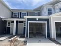 Charming two-story home with a covered entrance and an attached, spacious one-car garage at 1031 Mountain Crown St, Durham, NC 27703