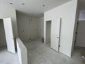 An interior room with white walls, ceilings, and trim with an open doorway at 1031 Mountain Crown St, Durham, NC 27703