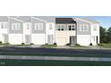 Charming modern townhome showcasing a white, gray, and dark exterior at 1114 Merlot Hills Ln, Durham, NC 27704