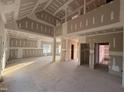 Bright living room with high ceilings and large windows, ready for customization at 1611 S Old Carriage Rd, Rocky Mount, NC 27804
