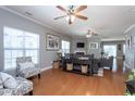 Spacious living area featuring a fireplace, hardwood floors, and recessed lighting at 3827 Heritage Spring Circle Cir, Wake Forest, NC 27587