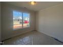 Bright bedroom with large window offering neighborhood views at 40 Wabash St, Pittsboro, NC 27312
