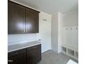 Inviting mudroom with custom cabinets, coat hooks, and a built-in bench at 40 Wabash St, Pittsboro, NC 27312