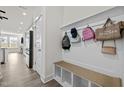 Hallway featuring coat rack and storage bench at 484 Autumn Rain St, Cary, NC 27519