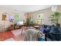 Bright living room with stylish decor, including plants and modern furniture at 7313 Longstreet Dr, Raleigh, NC 27615