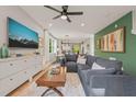 Bright and airy living room featuring a comfortable sectional sofa and hardwood floors at 1202 S Bloodworth St, Raleigh, NC 27601