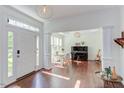 Inviting foyer with hardwood floors and views of the study at 1311 Antler Point Dr, Durham, NC 27713