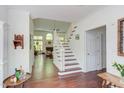 Open foyer featuring dark wood floors and a view of the living room at 1311 Antler Point Dr, Durham, NC 27713