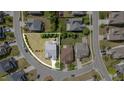 An aerial view shows the layout of the home and surrounding landscape at 2437 Everstone Rd, Wake Forest, NC 27587