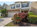 Beautiful home with well-manicured landscaping and a stone-accented garage at 2728 Evanston Ave, Durham, NC 27703