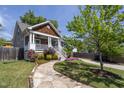 Inviting home with a stone walkway, lush lawn, and attractive landscaping at 507 Canal St, Durham, NC 27701