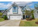Beautiful two-story home with well-maintained lawn and a spacious driveway at 5172 Copain Cove, Fuquay Varina, NC 27526
