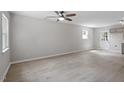 Spacious living room showcasing natural light and contemporary flooring at 804 Harper Rd, Hillsborough, NC 27278