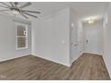 Bright living room showcasing hardwood floors, abundant natural light, and modern fixtures at 1272 Brown Velvet Ln, Apex, NC 27523