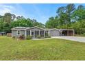 A well-maintained home with solar panels and a convenient carport at 3902 Booker Ave, Durham, NC 27713