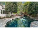 Relaxing backyard pool, gazebo, and spa, ideal for outdoor entertaining and leisurely enjoyment at 108 Martinique Pl, Cary, NC 27511
