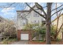 Charming home with purple shutters and a one-car garage and driveway at 244 Sweet Bay Pl, Carrboro, NC 27510
