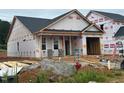 New construction shows exterior features and nearly completed construction details at 262 Bluejay St, Clayton, NC 27520