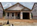 This is the exterior of a house under construction with an attached two car garage at 262 Bluejay St, Clayton, NC 27520