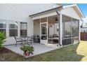 Inviting screened porch with comfortable seating, perfect for relaxing and entertaining at 3422 Norway Spruce Rd, Raleigh, NC 27616