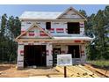 New construction home featuring durable exterior materials for lasting quality and energy efficiency in a desirable location at 57 Goldenrod Loop, Clayton, NC 27520