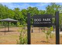 Kensley Grove dog park featuring shaded areas and play equipment for residents at 906 Kensley Grove Ln # 68, Fuquay Varina, NC 27526