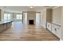 Bright, spacious living room featuring hardwood floors, fireplace, and open floor plan at 1091 Fairhaven Dr # 47, Mebane, NC 27302