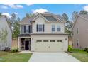 Attractive two-story house with a large garage and well-kept front yard at 2007 Seford Dr, Durham, NC 27703