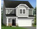 Craftsman-style home with a mix of horizontal and shingle siding, complemented by stone accents at 203 Steel Spring Rd # 21, Angier, NC 27501