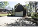 Spacious two-car garage and wide driveway with extra parking at 221 Ironwoods Dr, Chapel Hill, NC 27516