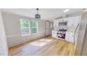 Open kitchen with stainless steel appliances and lots of natural light at 1622 Julian Oakley Rd, Rougemont, NC 27572