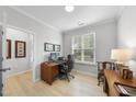 Bright office space with hardwood floors, a large window, and neutral walls at 2323 Big Sky Ln, Raleigh, NC 27615