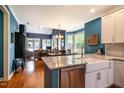 Bright kitchen features granite counters, stainless appliances, and an open layout at 5515 S Roxboro St # 23, Durham, NC 27713