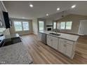 Kitchen island offers ample counter space, perfect for meal preparation at 56 Ruskin Dr, Smithfield, NC 27577