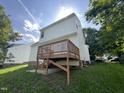 Exterior shot of the back of the house showing the deck at 620 Hanska Way, Raleigh, NC 27610