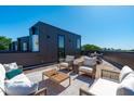 Inviting roof deck featuring comfortable seating, perfect for relaxing and enjoying the outdoors at 1302 Chamblee Hill Ct, Raleigh, NC 27608
