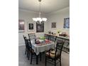 Formal dining area featuring chandelier lighting and elegant decor at 204 Plank Bridge Way, Morrisville, NC 27560