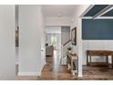 Bright foyer featuring hardwood floors, white trim, and stylish decor at 233 Berg St, Smithfield, NC 27577