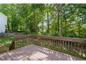 Wood deck overlooks the private, wooded backyard at 7019 Bellard Ct, Raleigh, NC 27617