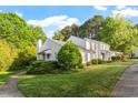 Well-maintained townhome with verdant lawn and mature trees at 101 Pickett Ln, Cary, NC 27511