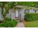 Inviting front porch and doorway entrance to this lovely, well-maintained home at 2442 Stevens Rd, Raleigh, NC 27610